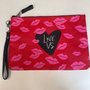 Red coated canvas Victoria’s Secret large wristlet make up bag